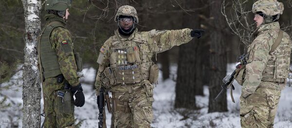 Солдаты из США на учениях в Литве Солдаты из США на учениях в Литве - Sputnik Литва