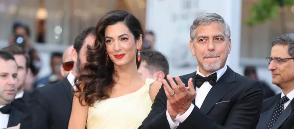 Американский актер Джордж Клуни и его жена британский адвокат Амаль Клуни Американский актер Джордж Клуни и его жена британский адвокат Амаль Клуни - Sputnik Lietuva