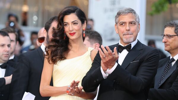 Американский актер Джордж Клуни и его жена британский адвокат Амаль Клуни - Sputnik Lietuva