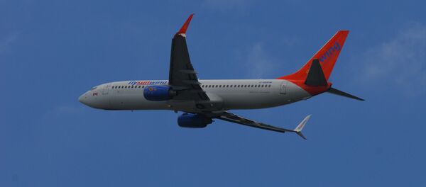 Самолет авиакомпании Sunwing, архивное фото - Sputnik Литва