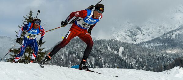 Литовский биатлонист Кароль Домбровски - Sputnik Литва