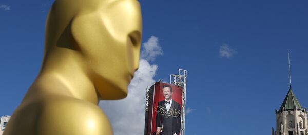 Джимми Киммел на рекламного плакате на бульваре Голливуд - Sputnik Литва