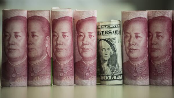 Китайские юани и американский доллар - Sputnik Литва