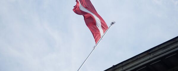 Флаг Латвии на здании Кабинета министров, архивное фото - Sputnik Литва