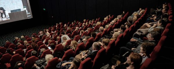 Люди в зрительном зале кинотеатра - Sputnik Литва