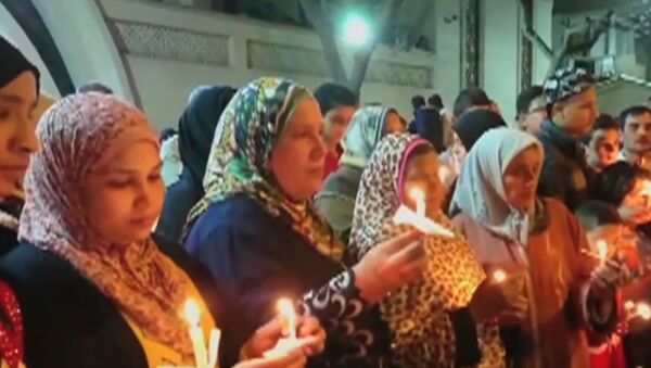 Египтяне скорбят о погибших при теракте в церквях - Sputnik Литва