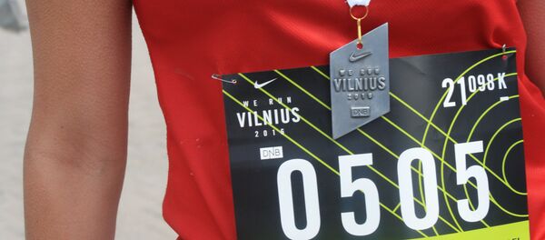 Символическая медаль марафона We run Vilnius - Sputnik Литва