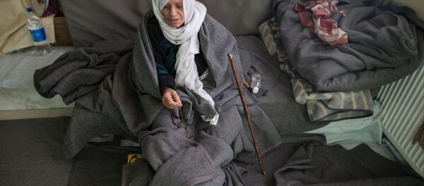 Лагерь беженцев в Дамаске Лагерь беженцев в Дамаске - Sputnik Литва