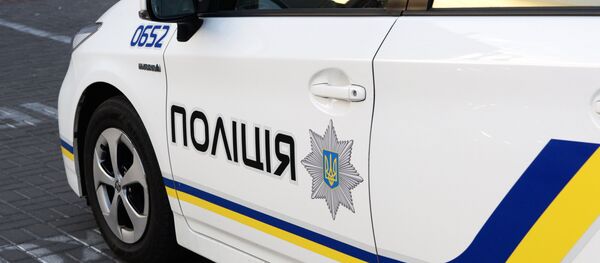 Сотрудники украинской полиции в Киеве - Sputnik Литва
