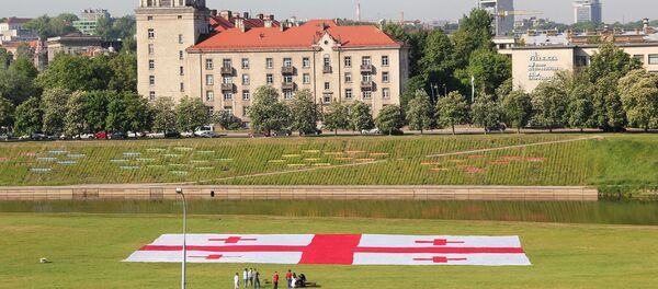 Флаг Грузии в Вильнюсе Флаг Грузии в Вильнюсе - Sputnik Литва