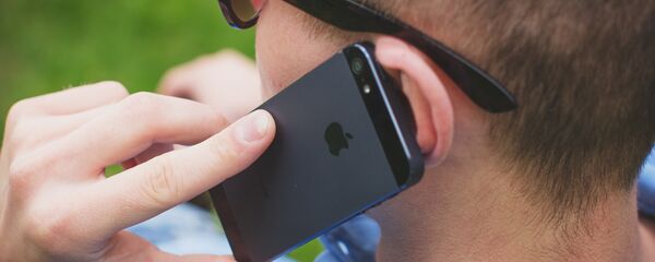 Разговор по мобильному телефону - Sputnik Литва