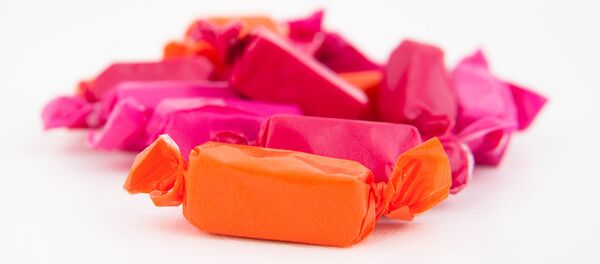 Конфеты в обертках Конфеты в обертках - Sputnik Lietuva