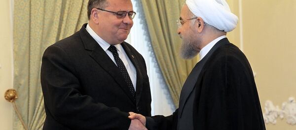 Глава МИД Литвы Линас Линкявичюс и президент Ирана Хасан Рухани - Sputnik Литва