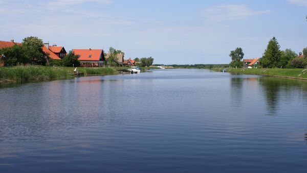 Река Миния - центральная улица деревни Минге - Sputnik Литва