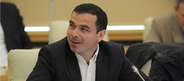 Кандидат политических наук Артур Атаев Кандидат политических наук Артур Атаев - Sputnik Литва