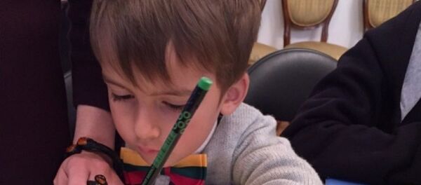 Мальчик в воскресной литовской школе  Саенкт-петербурге - Sputnik Lietuva