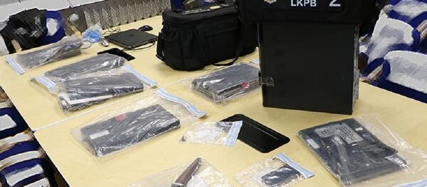 Изъятые полицией вещественные доказательства в деле о распространении детской порнографии Изъятые полицией вещественные доказательства в деле о распространении детской порнографии - Sputnik Lietuva