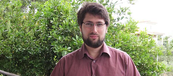 Василий Колташов, руководитель Центра экономических исследований Института глобализации и социальных движений, архивное фото - Sputnik Литва