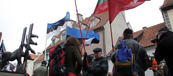 Шествие легионеров Ваффен СС и их сторонников в Риге Шествие легионеров Ваффен СС и их сторонников в Риге - Sputnik Литва