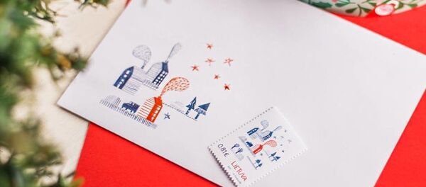 Рождественские марки Почты Литвы с запахом имбирного печенья Рождественские марки Почты Литвы с запахом имбирного печенья - Sputnik Lietuva