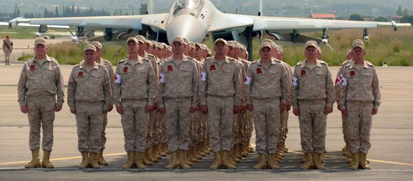 Военнослужащие на российской авиабазе Хмеймим в Сирии - Sputnik Литва