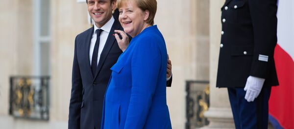 Пресс-конференция Э. Макрона и А. Меркель в Париже, архивное фото - Sputnik Литва