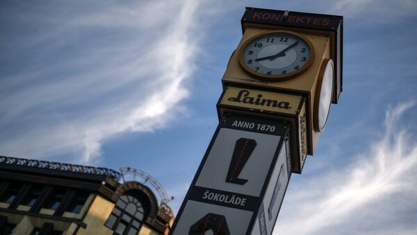 Города мира. Рига. Часы Laima, архивное фото - Sputnik Литва