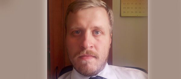 Заместитель директора Института энергетики и финансов Алексей  Белогорьев - Sputnik Литва