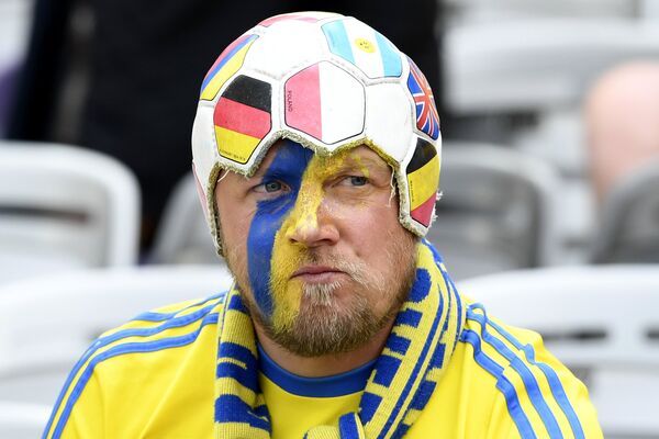 Болельщик Швеция на игре Швеция против Италии на Чемпионате Европы по футболу в 2016 году - Sputnik Lietuva