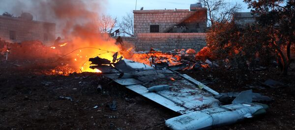 Сбитый российский Су-25 в Сирии, 3 февраля 2018 года Сбитый российский Су-25 в Сирии, 3 февраля 2018 года - Sputnik Литва