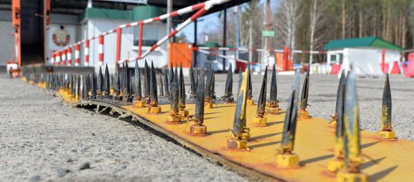 Priverstinė automobilių stabdymo priemonė (Ežys) Priverstinė automobilių stabdymo priemonė (Ežys) - Sputnik Lietuva