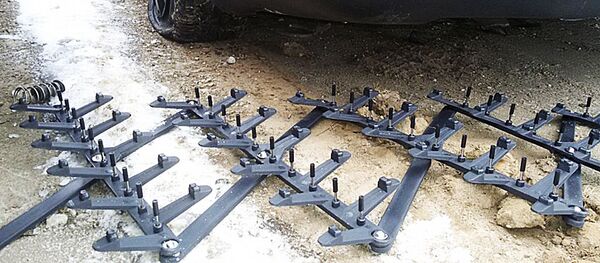 Дорожный еж - средство принудительной остановки - Sputnik Литва