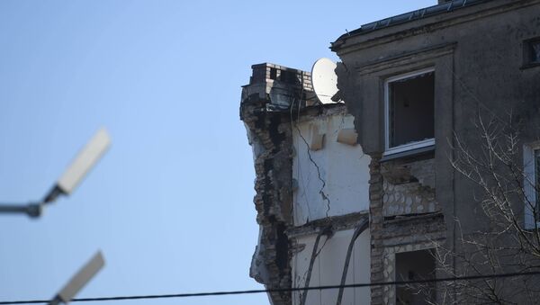 Обрушившийся из-за взрыва газа дом в Познани, 4 марта 2018 года - Sputnik Литва