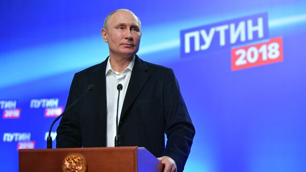Кандидат в президенты РФ, действующий президент РФ Владимир Путин, 18 марта 2018 года - Sputnik Литва