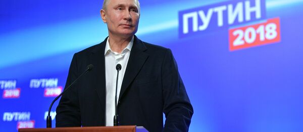 Кандидат в президенты РФ, действующий президент РФ Владимир Путин, 18 марта 2018 года - Sputnik Литва
