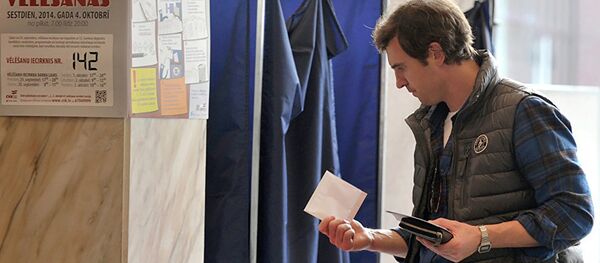 Голосование на выборах в Латвии. Архивное фото - Sputnik Литва