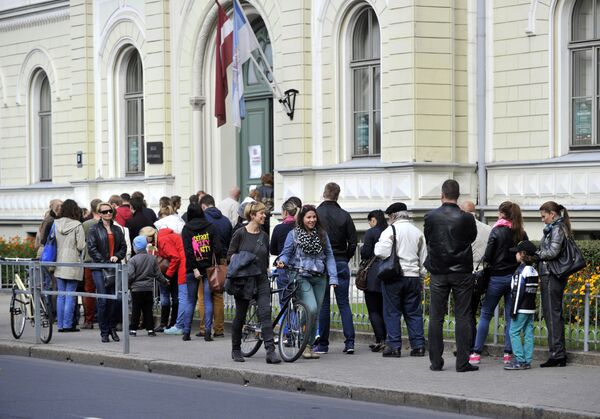Голосование на парламентских выборах в Латвии Голосование на парламентских выборах в Латвии - Sputnik Литва