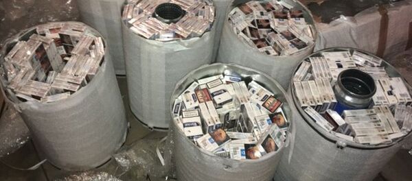 Vilniuje likviduotas šešėlinis cigarečių kontrabandos logistikos centras Vilniuje likviduotas šešėlinis cigarečių kontrabandos logistikos centras - Sputnik Lietuva