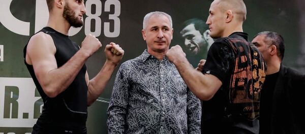 Литовский боец Сергей Гречихо и боец из России Алихан Сулейманов - Sputnik Литва