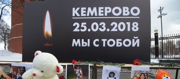 Акции в память о погибших при пожаре в ТЦ Зимняя вишня Акции в память о погибших при пожаре в ТЦ Зимняя вишня - Sputnik Lietuva