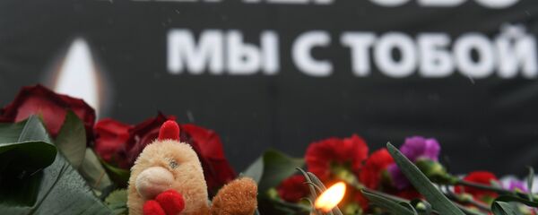 Акции в память о погибших при пожаре в ТЦ Зимняя вишня Акции в память о погибших при пожаре в ТЦ Зимняя вишня - Sputnik Lietuva