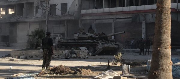 Освобожденный населенный пункт Кафр-Батна в Восточной Гуте, архивное фото Освобожденный населенный пункт Кафр-Батна в Восточной Гуте, архивное фото - Sputnik Литва