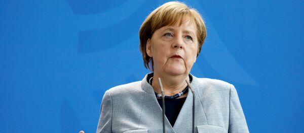 Канцлер Германии Ангела Меркель выступает на совместной пресс-конференции с президентом Украины - Sputnik Литва