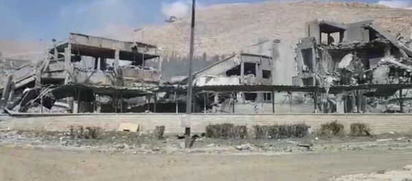 Подвергшийся ракетному удару исследовательский центр Барза в Дамаске Подвергшийся ракетному удару исследовательский центр Барза в Дамаске - Sputnik Литва