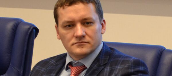 Белорусский экономист Дмитрий Болкунец - Sputnik Литва