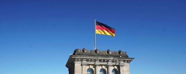Флаг Германии на здании Рейхстага, архивное фото - Sputnik Литва