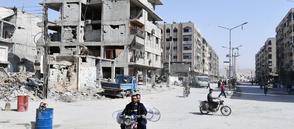 Ситуация в сирийском городе Дума Ситуация в сирийском городе Дума - Sputnik Литва