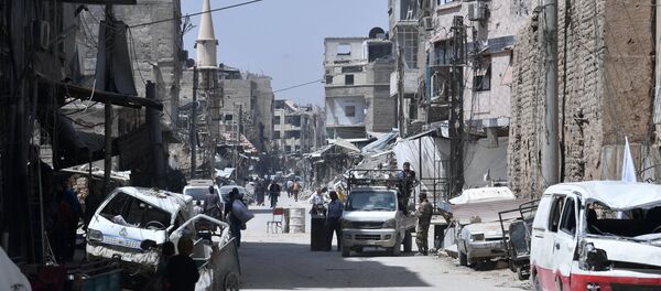 Ситуация в сирийском городе Дума, 18 апреля 2018 года - Sputnik Литва