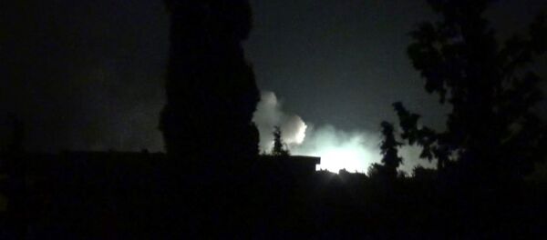 Последствия атаки на военную базу САР возле Хамы Последствия атаки на военную базу САР возле Хамы - Sputnik Литва
