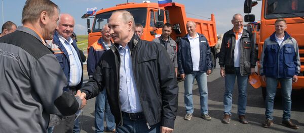 Президент РФ Владимир Путин принял участие в открытии Крымского моста, 15 мая 2018 года Президент РФ Владимир Путин принял участие в открытии Крымского моста, 15 мая 2018 года - Sputnik Литва